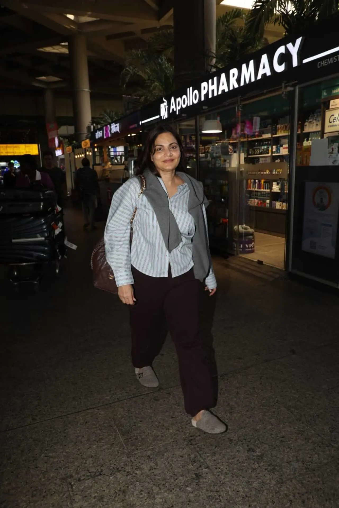 Alvira Khan Agnihotri was also snapped during an outing in the city. Keeping it simple and comfortable, she wore a striped shirt layered with a grey sweater, paired with dark trousers.